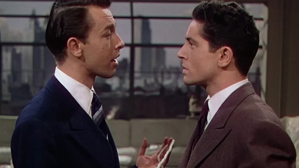 Brandon and Phillip in tense close conversation from Hitchcock's Rope, shame and hidden identity essay, 49Grey